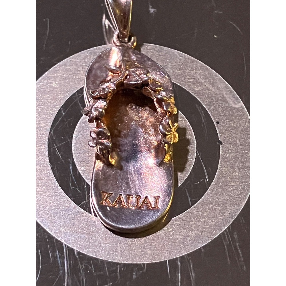 925 PCU Flip Flop with Flower Adornment Pendant labeled Kauai